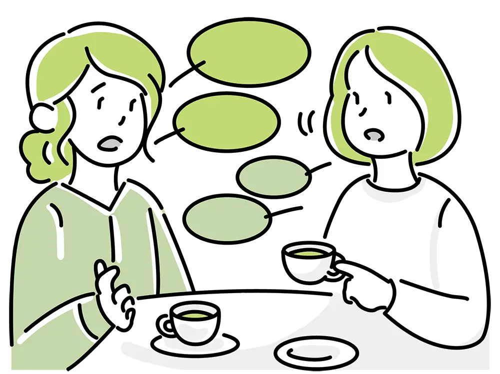 女性が女友達に相談している様子